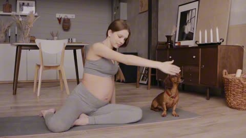 Pregnant women Yoga with dog