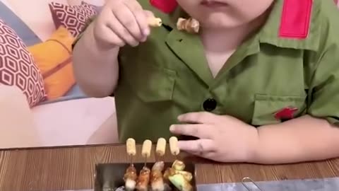 Boy cooking demo with little kitchen appliances