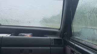 Couple Clever Solution to Broken Windshield Wipers