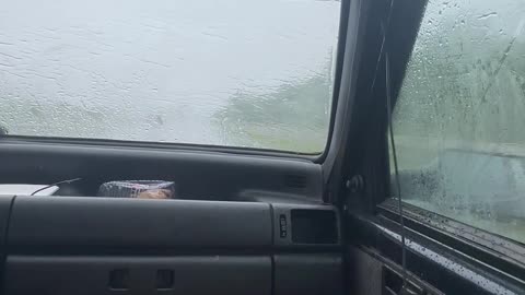 Couple Clever Solution to Broken Windshield Wipers