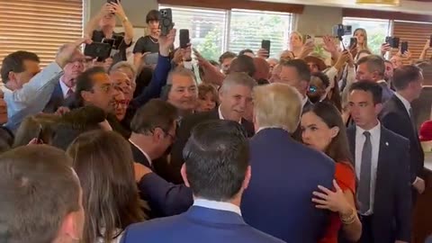 Group Prayer with Trump at Versailles restaurant in Miami after pleading not guilty.