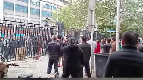 BREAKING: In Wuhan the anti-lockdown protesters are tearing down barricades shouting