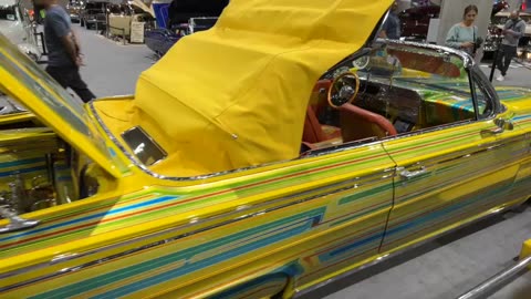 Eye-Catching 1963 Impala Convertible Lowrider: Vibrant Yellow Masterpiece