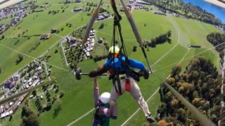 Tourist hangs on for his life, after pilot forgets to attach him to glider