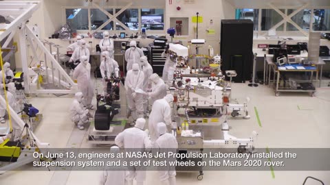 Pit Crew for Mars_ NASA's Mars 2020 Rover Gets Some Wheels (time lapse)