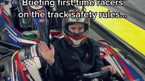 Briefing first time racers on the track safety rules...