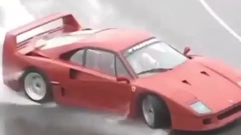 old lambo drifting pon wet watery road