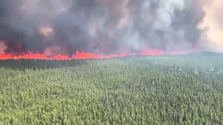 Wildfires in western Canada blanket sky in smoke
