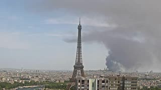 Smoke drifts over Paris after fire in suburban warehouse