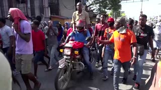Haitian police fire tear gas against protesters