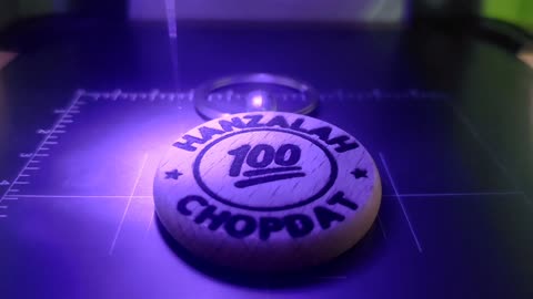 Laser Engraving the name Hanzalah Chopdat in English