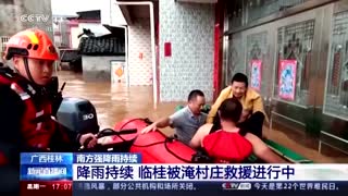 Thousands trapped in southern China's heavy floods