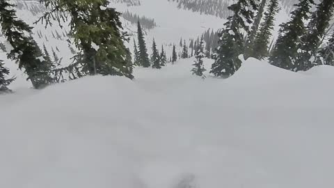Heli-Snowboarder Caught in Snow Slide in Backcountry