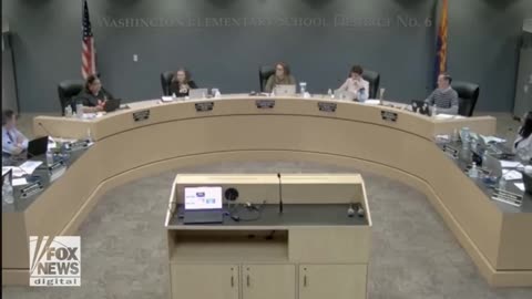 Arizona school board member, wearing cat ears during a meeting