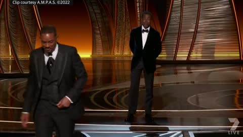 Watch the uncensored moment Will Smith smacks Chris Rock on stage at the Oscars, drops F-bomb