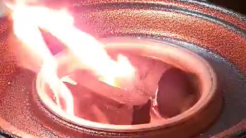 It's a briquette fire in a brazier.