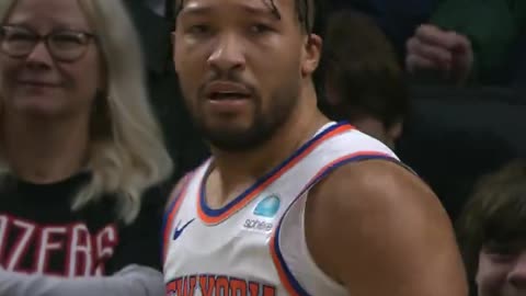 Jalen Brunson tosses it high off the glass to cash in on the and-1!