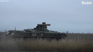 Mobilised Russian troops train using tanks and missile systems