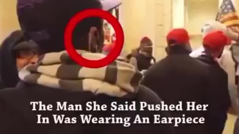Man with earpiece forcing people inside Capitol on January 6th