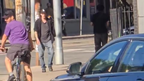 Violent African illegal on streets of Toronto tries to steal White man's bike