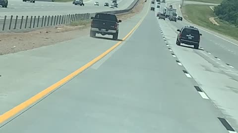 Out of Control Pickup Truck Spins Out on Highway