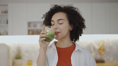 Woman Drink a Good Tasty Smoothie