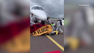 Climate activists block private jets in Amsterdam