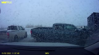 Dash Cam Captures Snowy Crash Scene