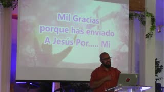 Pastor Julio preaching the Word