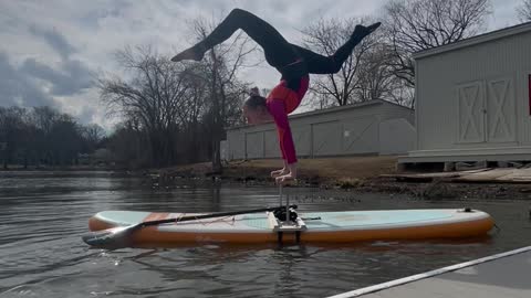 Mesmerizing Handstand on a Paddleboard