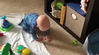Baby crawls for laser pointer for cats. Ultimate parenting hack 😆