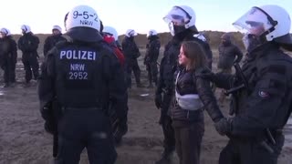 Greta Thunberg gets arrested for the cameras.