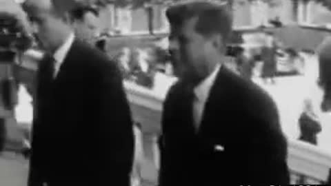 President John F Kennedy arrives in Paris. Do you notice anything interesting?