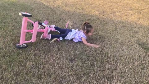 Toddler Faceplants Riding Her Tricycle and Shakes It Off