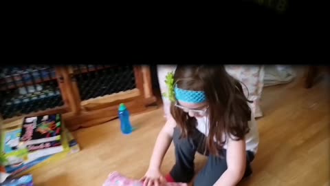 April 2017 Gabrielle unwrapping gifts at daddy's part 8