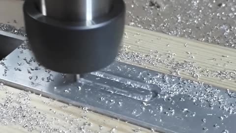 CNC Cutting into alumnium extrusion channel profile.