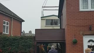 Static caravan being craned into position #6