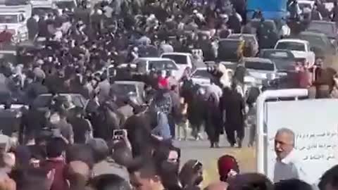 A huge crowd marches towards the Saqqez cemetery in Iran's Kurdistan province