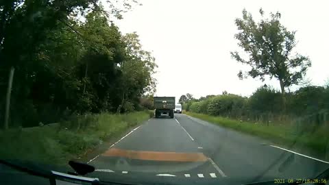 Tractor Hits Overtaking Van