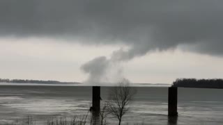 Strange looking tornado forms over the Mississippi River