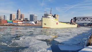 Tug towing ship through ice Cuyahoga River 2/1/22