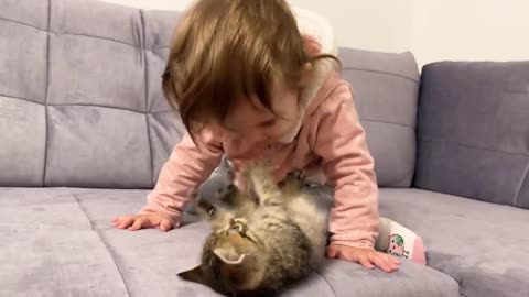 So Cute baby playing With cute cat