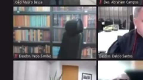 Fake bookshelf falls during virtual meeting