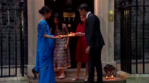 British PM Sunak and family light diyas for Diwali