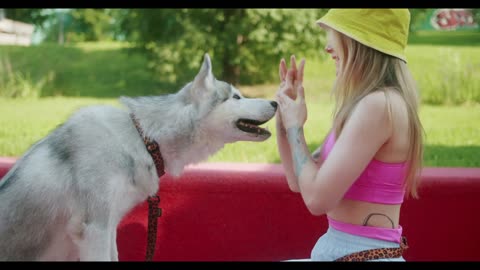 Woman Training Her Dog