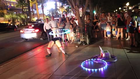 A cool hula hoop dancer performing on the Las Vegas strip.