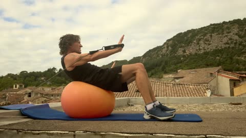 Crunch Lateral on Stability Ball - Resistance Band