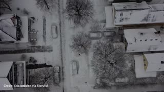 Drone footage shows snow-buried Buffalo neighborhoods