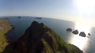 Incredible drone dives down Icelandic mountain
