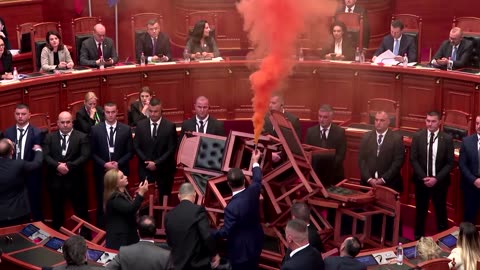 Albanian opposition protests budget with smoke bombs